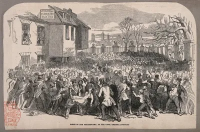 The Royal Hospital, Chelsea: a large crowd outside the wall with constables struggling to keep order