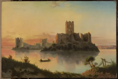 The ruins of the Trakai Castle at sunset.