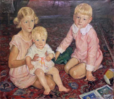 Three children on a carpet