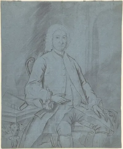 Three-quarter length portrait study of a man seated at a desk with a dog