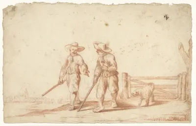 Twee jongens lopend op een pad bij een hek