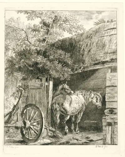 Twee paarden in een boerenschuur