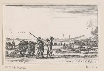Twee soldaten in gesprek bij een kanon