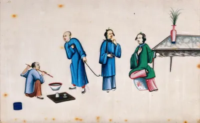 Two Chinese men and two women smoking from pipes