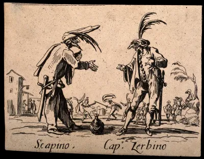 Two Commedia dell'arte street entertainers performing together