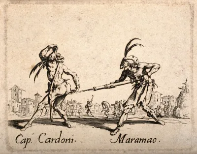 Two Commedia dell'arte street entertainers using a clyster as part of their performance