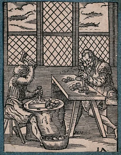 Two craftsmen making thimbles