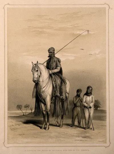 Two dwarfs with their owner, a guard of the Raja of Patiala