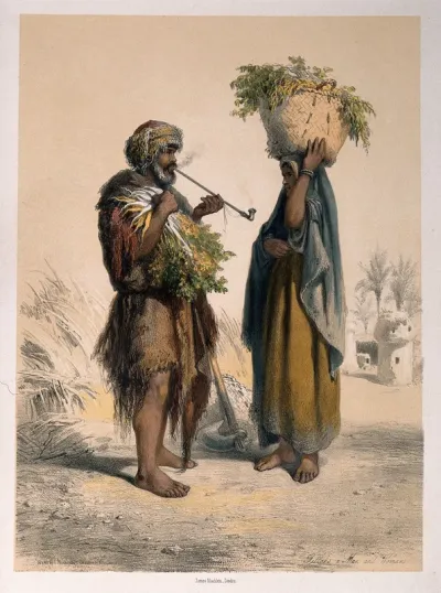 Two Egyptian peasants, the man smokes a pipe and the woman has a basket on her head