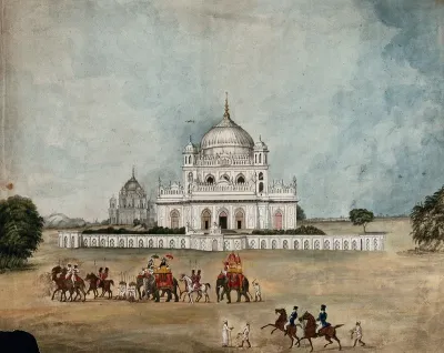 Two Englishmen on elephants riding in convoy before a Mughal palace or tomb