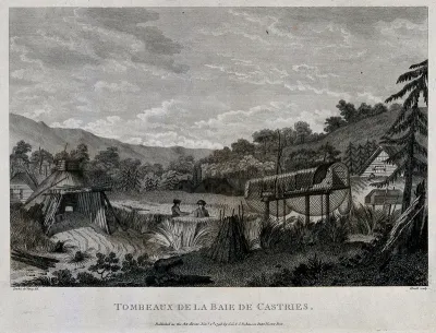 Two European men standing next to tombs in the Bay of Castries, Saint Lucia