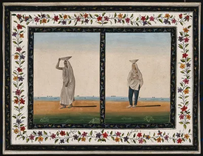 Two female labourers carrying a load on their head