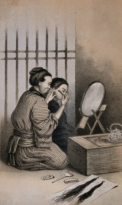 Two figures kneeling before a mirror; one shaves the face of the other