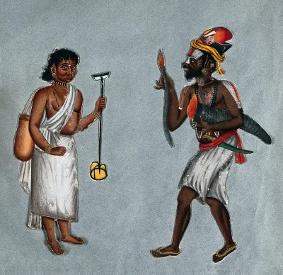 Two fire eaters in southern India: a man and a woman