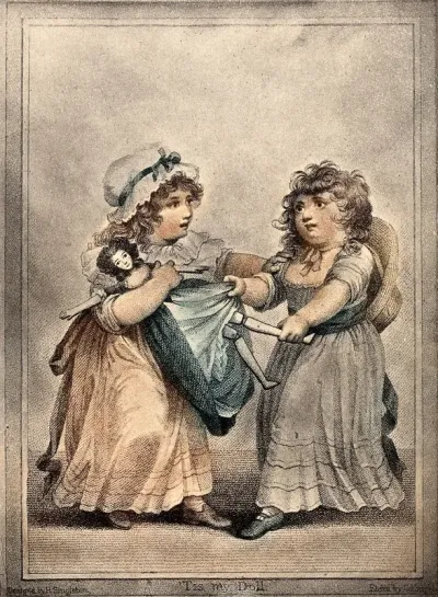 Two girls fight over a doll which they both lay claim to