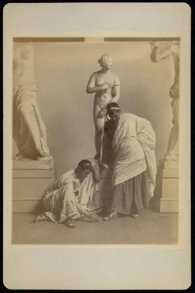 Two Male Students in Grecian Costume Before a Plaster Cast of Aphrodite in the Cast Room of the Pennsylvania Academy