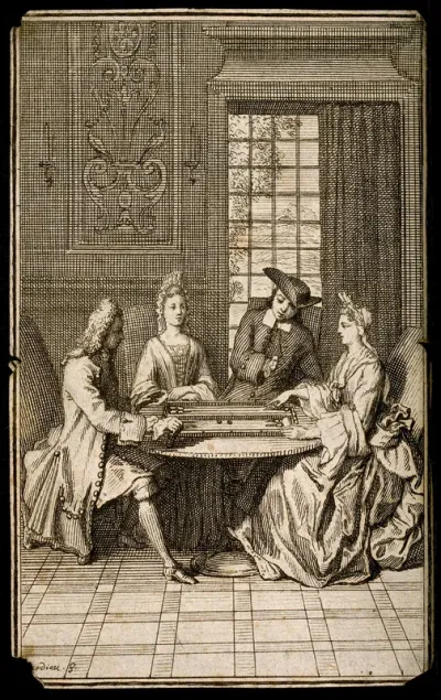 Two men and two women sit at a table playing backgammon (trictrac) in France