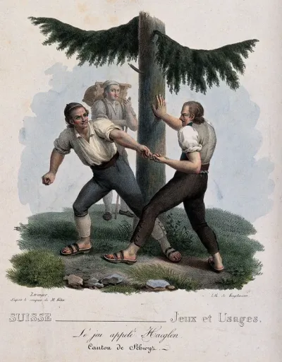 Two men are testing their strength against one another by finger-wrestling