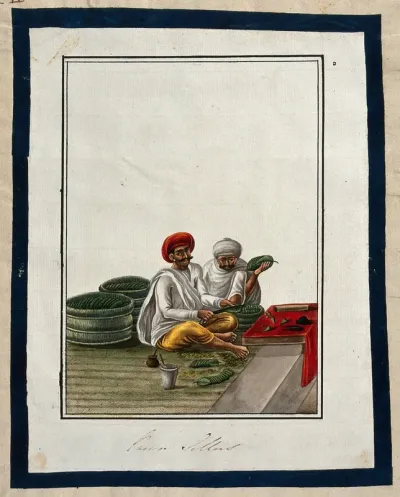 Two men selling pan (betel leaves)