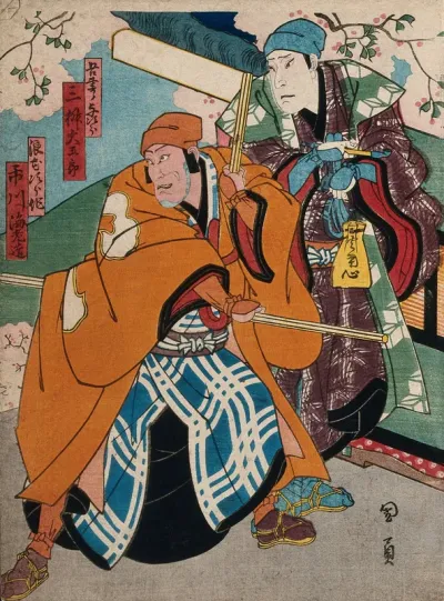 Two men under a cherry blossom