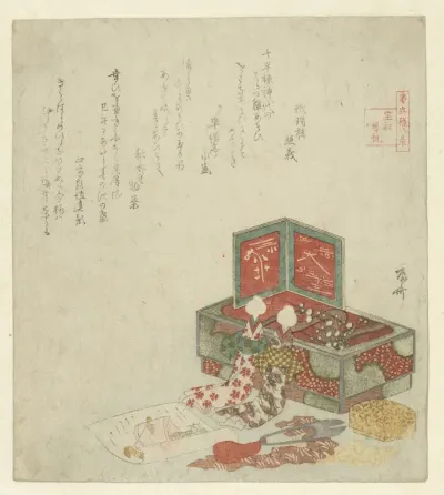 Two Puppets Resting Against a Box