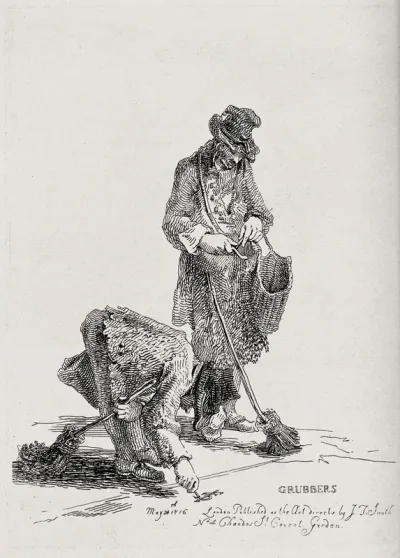 Two street cleaners grubbing the surface of a street with brooms and knives