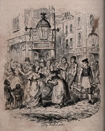 Two women are arguing in the street at Seven Dials in London watched by a crowd
