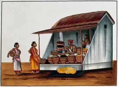 Two women at a shop selling grains and pulses