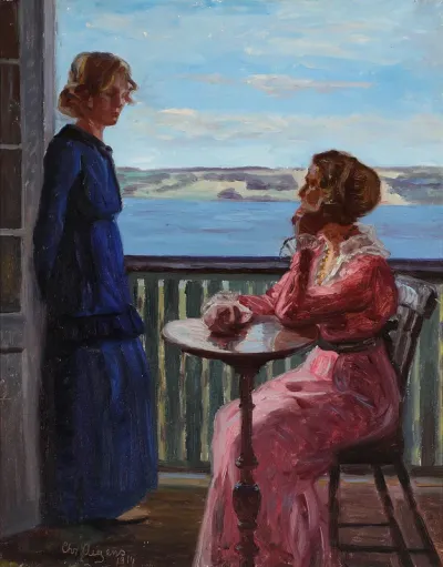 Two women on a balcony with a view of Vejle fiord.