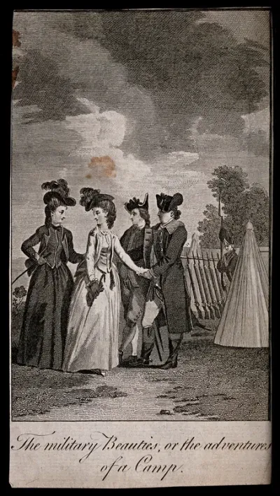 Two women visit two soldiers at their training camp on Coxhead Common, Kent