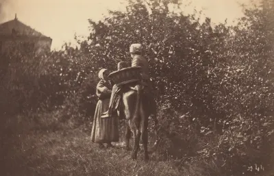 Two Women with Donkey