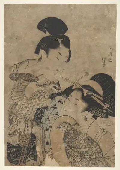 Two women with falcons