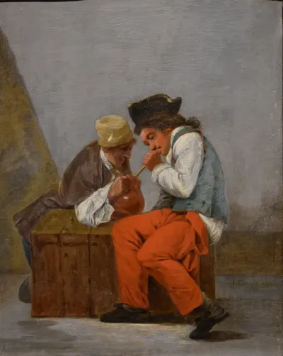 Two young soldiers drinking from a jug