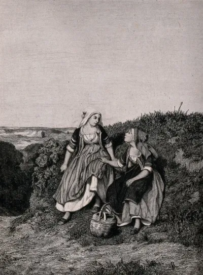 Two young women in Breton costume are talking together on the side of a grassy bank