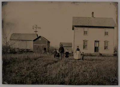Untitled (A Man, a Woman, and Three Children Standing in Front of a Farmhouse)