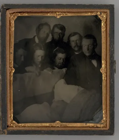 Untitled (People Standing Around a Open Casket)
