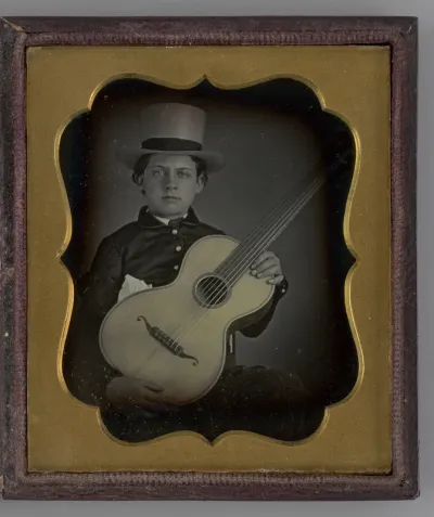 Untitled (Portrait of a Boy Holding a Guitar)