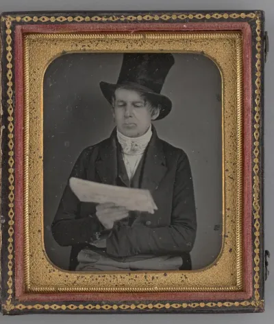 Untitled (Portrait of a Man Reading a Newspaper and Wearing a Top Hat)