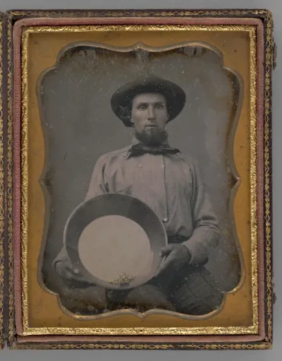 Untitled (Portrait of a Man Wearing a Hat, Holding a Mining Pan)