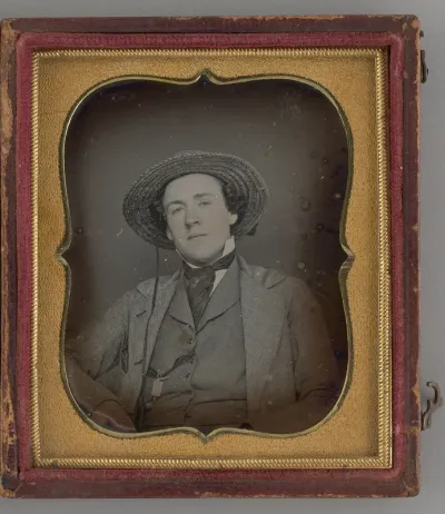 Untitled (Portrait of a Man with a Straw Hat)