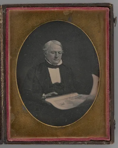 Untitled (Portrait of a Seated Man Holding a Map)