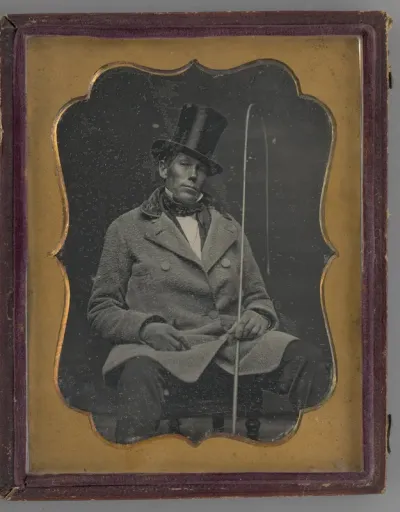 Untitled (Portrait of a Seated Man Wearing a Top Hat)