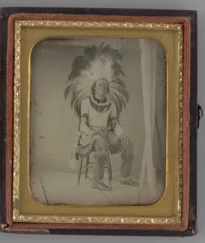 Untitled (Portrait of Seated Man with Headdress)