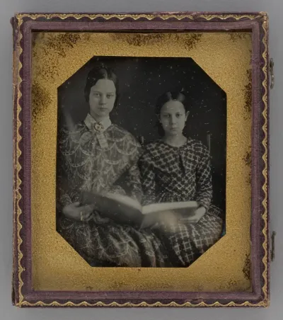 Untitled (Portrait of Seated Two Girls Holding a Book)