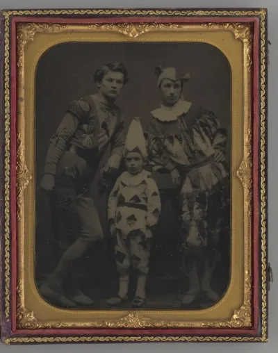 Untitled (Portrait of two Men and one Boy, Dressed in Clown Costumes)