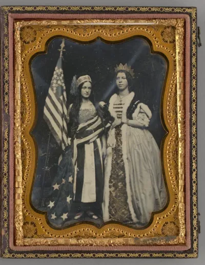 Untitled (Portrait of Two Standing Women Holding an American Flag)