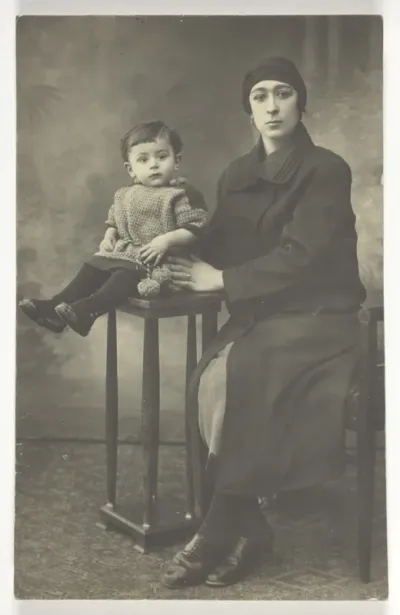 Untitled Postcard (Woman with Boy on Stand)