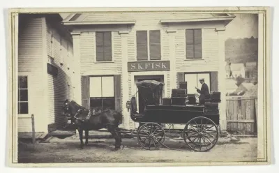 Untitled (S.K. Fisk store with delivery wagon)