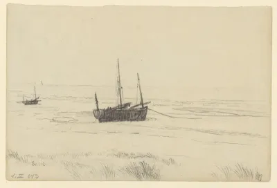 View of a beach with two boats