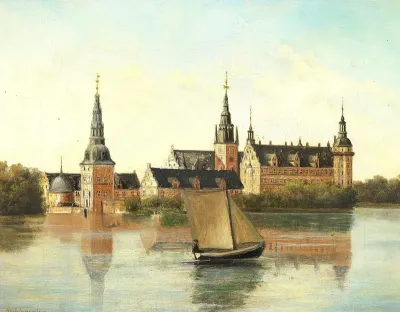 View of Frederiksborg Castle and the lake on a summer day.